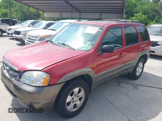 2001 Mazda Tribute LX with VIN 4F2YU09161KM19432, listed as a IAAI auction lot 42052870 with 162,911 mi miles and . Bid and sale history available at carsss.com. Image 2.