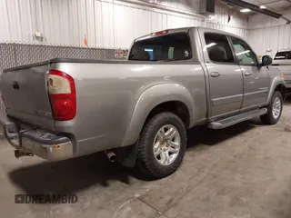 2004 Toyota Tundra SR5 with VIN 5TBDT44104S441271, listed as a IAAI auction lot 41823831 with 296,637 mi miles and . Bid and sale history available at DreamBid. Image 4.
