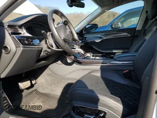 2023 Audi S8 with VIN WAULSAF85PN000614, listed as a Copart auction lot 43214585 with 20,079 mi miles and Salvage Title. Bid and sale history available at DreamBid. Image 7.