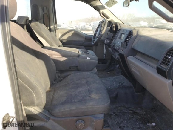 2019 Ford F-150 XL with VIN 1FTMF1C50KKC79325, listed as a Copart auction lot 84731164 with 100,643 mi miles and Salvage Title. Bid and sale history available at carsss.com. Image 10.