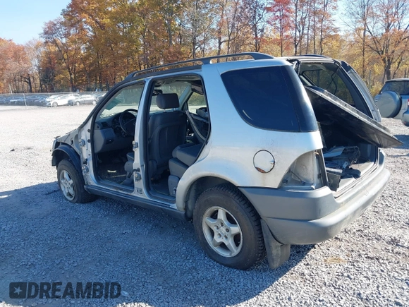 1999 Mercedes-Benz M 320/430/500 with VIN 4JGAB54E5XA086715, listed as a IAAI auction lot 41546385 with 188,551 mi miles and . Bid and sale history available at DreamBid. Image 3.