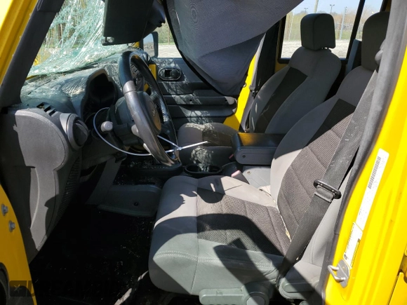 2008 Jeep Wrangler Unlimited X with VIN 1J4GA39158L621957, listed as a Copart auction lot 52737815 with 135,489 mi miles and Salvage title. Bid and sale history available at DreamBid. Image 7.