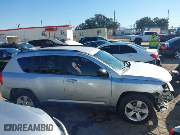 2011 Jeep Compass with VIN 1J4NT1FA4BD139153, listed as a IAAI auction lot 41665481 with 164,412 mi miles. Bid and sale history available at carsss.com. Image 14.