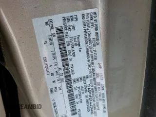 2018 Ford Focus SE z VIN 1FADP3F27JL226890, wystawiony jako Copart lot #56505085 z przebiegiem 112 865 mil mil oraz Szkoda całkowita • Salvage title. Historia ofert i sprzedaży dostępna na DreamBid. Obrazek 13.