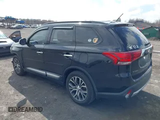 2016 Mitsubishi Outlander SE with VIN JA4AD3A39GZ003885, listed as a IAAI auction lot 41869646 with 193,320 mi miles and . Bid and sale history available at DreamBid. Image 3.