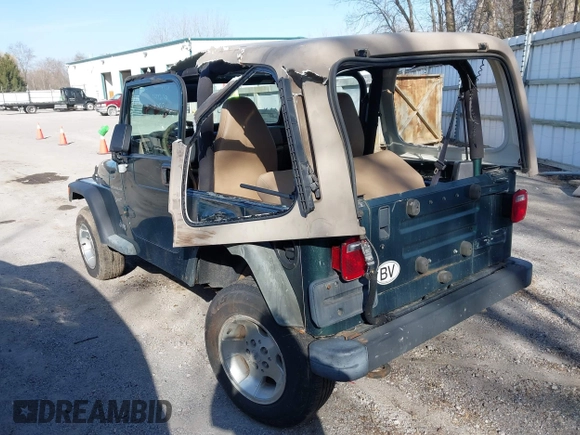 2001 Jeep Wrangler Sport with VIN 1J4FA49S31P317597, listed as a IAAI auction lot 41839524 with 145,164 mi miles. Bid and sale history available at carsss.com. Image 3.