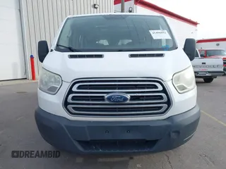 2015 Ford Transit Cargo with VIN 1FTNR1ZM7FKB03582, listed as a IAAI auction lot 41496652 with 205,663 mi miles and . Bid and sale history available at DreamBid. Image 12.