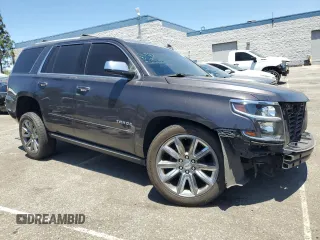2017 Chevrolet Tahoe Premier with VIN 1GNSCCKC7HR241402, listed as a Copart auction lot 63127315 with 127,273 mi miles and Salvage title. Bid and sale history available at DreamBid. Image 4.