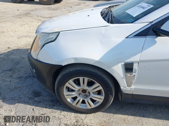 2011 Cadillac SRX Performance Collection with VIN 3GYFNBEYXBS540807, listed as a IAAI auction lot 42034047 with 198,429 mi miles. Bid and sale history available at carsss.com. Image 13.