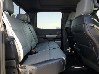 2023 Ford F-150 Lightning Pro with VIN 1FTVW1EV5PWG63666, listed as a Copart auction lot 60998415 with 35,089 mi miles and Salvage title. Bid and sale history available at DreamBid. Image 10.