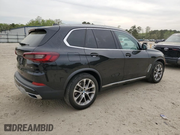 2021 BMW X5 xDrive40i with VIN 5UXCR6C08M9D83268, listed as a Copart auction lot 51781335 with 97,885 mi miles and Salvage title. Bid and sale history available at DreamBid. Image 3.