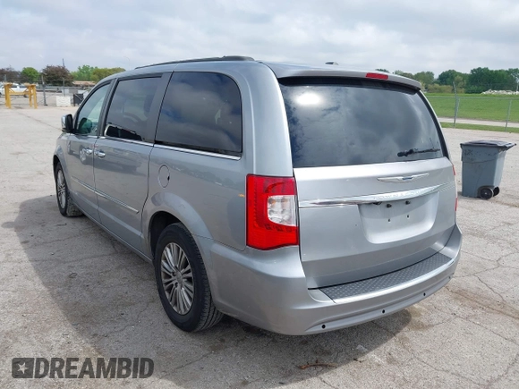 2014 Chrysler Town & Country Touring-L with VIN 2C4RC1CG2ER107917, listed as a IAAI auction lot 42180194 with 169,447 mi miles. Bid and sale history available at carsss.com. Image 3.
