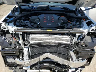 2023 BMW XM z VIN 5YM23CS00P9R52198, wystawiony jako Copart lot #57953684 z przebiegiem 5428 mil mil oraz Szkody całkowita. Historia ofert i sprzedaży dostępna na DreamBid. Obrazek 11.