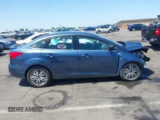 2018 Ford Focus Titanium with VIN 1FADP3J21JL323767, listed as a IAAI auction lot 42375218 with 104,440 mi miles and . Bid and sale history available at DreamBid. Image 13.