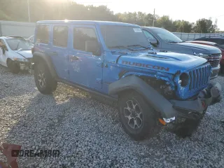 2022 Jeep Wrangler Unlimited Rubicon with VIN 1C4HJXFG8NW106102, listed as a Copart auction lot 77374814 with 45,546 mi miles and Salvage title. Bid and sale history available at DreamBid. Image 4.
