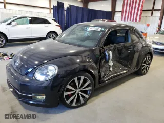 2012 Volkswagen Beetle 2.0T Black Turbo Launch Edition PZEV with VIN 3VWVA7AT4CM604847, listed as a Copart auction lot 88374685 with 135,278 mi miles and Salvage Title. Bid and sale history available at carsss.com. Image 1.
