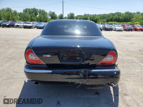 2004 Jaguar XJ с VIN SAJEA73B34TG10749, выставлен на аукционе Copart как лот 56574025 с пробегом 72 240 миль миль и Списание • Salvage title. История ставок и продаж доступна на DreamBid. Изображение 6.