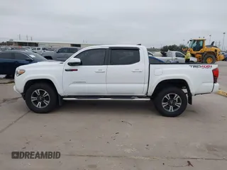 2019 Toyota Tacoma SR z VIN 3TMCZ5AN4KM220154, wystawiony jako IAAI lot #41602065 z przebiegiem 92 345 mil mil oraz . Historia ofert i sprzedaży dostępna na DreamBid. Obrazek 15.