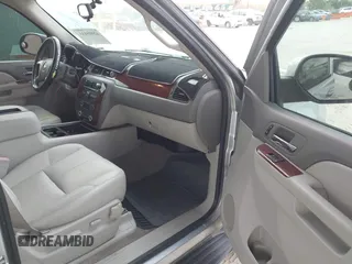 2012 Chevrolet Tahoe LT z VIN 1GNSCBE03CR144606, wystawiony jako IAAI lot #42005433 z przebiegiem 193 386 mil mil oraz . Historia ofert i sprzedaży dostępna na DreamBid. Obrazek 5.