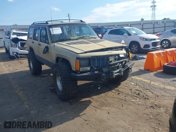 1995 Jeep Cherokee Sport with VIN 1J4FJ68S3SL555908, listed as a IAAI auction lot 42222016 with 283,444 mi miles and . Bid and sale history available at DreamBid. Image 1.
