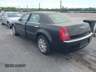 2007 Chrysler 300 C with VIN 2C3LA63H97H861511, listed as a IAAI auction lot 42136495 with 113,972 mi miles. Bid and sale history available at carsss.com. Image 3.