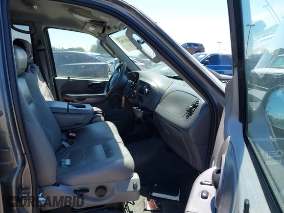 2003 Ford F-150 XLT with VIN 1FTRW08L63KD17116, listed as a IAAI auction lot 42811062 with Not provided miles and . Bid and sale history available at DreamBid. Image 5.