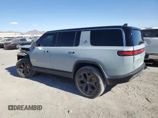2023 Rivian R1S Adventure z VIN 7PDSGABA1PN021963, wystawiony jako Copart lot #43451105 z przebiegiem 165 mil mil oraz Szkody całkowita. Historia ofert i sprzedaży dostępna na DreamBid. Obrazek 2.