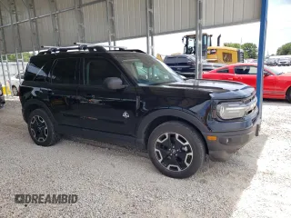 2023 Ford Bronco Sport Outer Banks with VIN 3FMCR9C60PRD13045, listed as a Copart auction lot 57874625 with 27,218 mi miles and Salvage title. Bid and sale history available at DreamBid. Image 4.