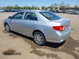 2010 Toyota Corolla with VIN 1NXBU4EE1AZ319230, listed as a IAAI auction lot 41988978 with 238,497 mi miles. Bid and sale history available at carsss.com. Image 3.