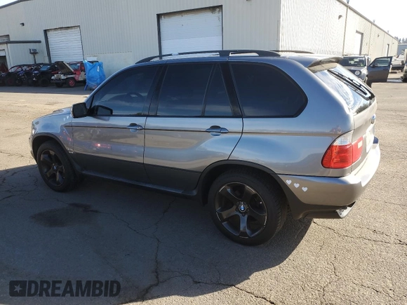 2005 BMW X5 4.4i with VIN 5UXFB53575LV16692, listed as a Copart auction lot 77866544 with 153,963 mi miles and Clean Title. Bid and sale history available at carsss.com. Image 2.
