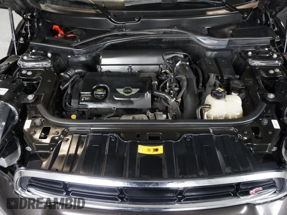 2016 MINI Countryman S with VIN WMWZC5C55GWU00997, listed as a Copart auction lot 58840965 with 41,217 mi miles and Salvage title. Bid and sale history available at DreamBid. Image 7.