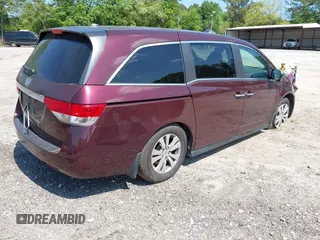 2014 Honda Odyssey EX-L z VIN 5FNRL5H64EB076088, wystawiony jako IAAI lot #42144781 z przebiegiem 174 135 mil mil oraz . Historia ofert i sprzedaży dostępna na DreamBid. Obrazek 4.