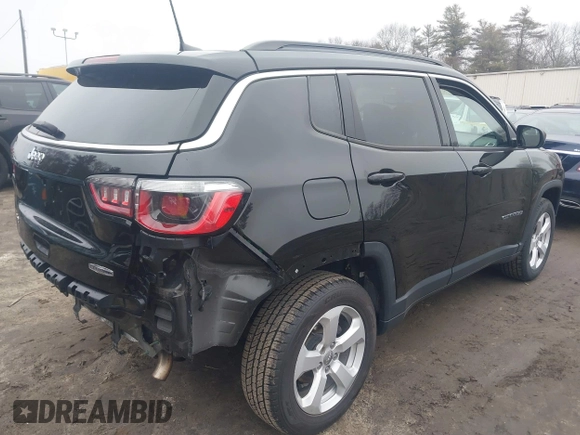2018 Jeep Compass Altitude with VIN 3C4NJDBB0JT399781, listed as a IAAI auction lot 41711499 with 39,891 mi miles and . Bid and sale history available at carsss.com. Image 4.