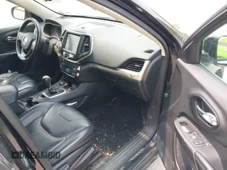 2016 Jeep Cherokee Limited z VIN 1C4PJMDB1GW196035, wystawiony jako IAAI lot #42347722 z przebiegiem 148 599 mil mil oraz . Historia ofert i sprzedaży dostępna na DreamBid. Obrazek 5.