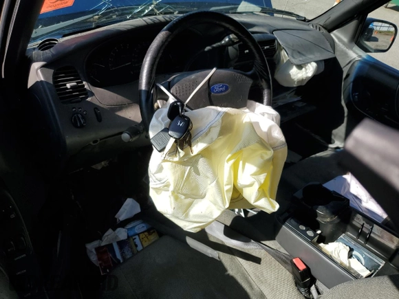 2002 Ford Ranger XLT Off-Road with VIN 1FTZR45U02PA35583, listed as a Copart auction lot 55477815 with 194,401 mi miles and Salvage title. Bid and sale history available at DreamBid. Image 8.