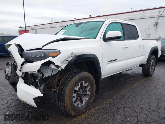 2021 Toyota Tacoma SR5 with VIN 3TMDZ5BN1MM100575, listed as a IAAI auction lot 41516274 with 61,974 mi miles and . Bid and sale history available at DreamBid. Image 18.