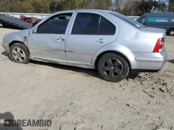 2004 Volkswagen Jetta GLS with VIN 3VWSR69M24M123449, listed as a Copart auction lot 48115325 with 302,443 mi miles and Salvage title. Bid and sale history available at DreamBid. Image 2.