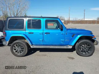 2023 Jeep Wrangler Sahara z VIN 1C4JJXP60PW513969, wystawiony jako IAAI lot #41766631 z przebiegiem 34 819 mil mil oraz . Historia ofert i sprzedaży dostępna na DreamBid. Obrazek 14.