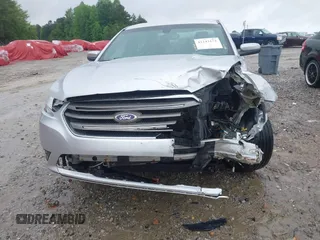 2016 Ford Taurus SEL with VIN 1FAHP2E85GG103883, listed as a IAAI auction lot 42243173 with 119,334 mi miles and . Bid and sale history available at DreamBid. Image 12.