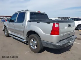 2004 Ford Explorer Sport Trac XLS with VIN 1FMZU77K84UC04230, listed as a IAAI auction lot 41909068 with 237,662 mi miles. Bid and sale history available at carsss.com. Image 3.