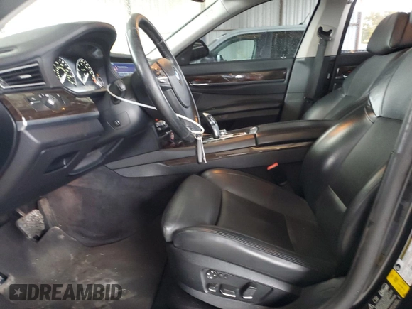 2011 BMW 7 Series 750i xDrive with VIN WBAKC6C56BC394810, listed as a Copart auction lot 79025014 with 152,399 mi miles and Salvage title. Bid and sale history available at DreamBid. Image 7.