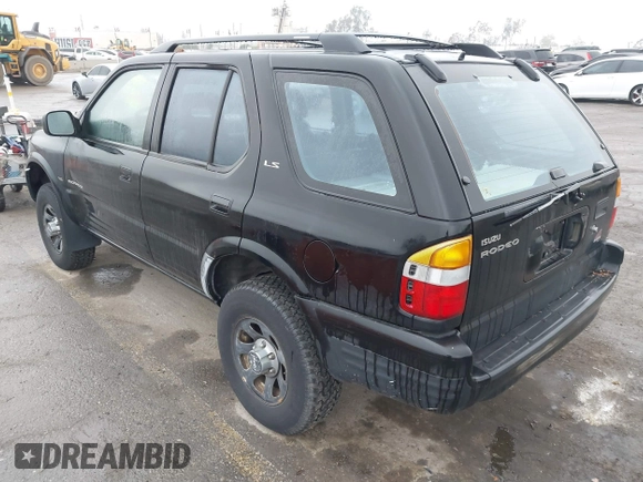 1998 Isuzu Rodeo S z VIN 4S2CM58W6W4336183, wystawiony jako IAAI lot #41874570 z przebiegiem 162 097 mil mil oraz . Historia ofert i sprzedaży dostępna na DreamBid. Obrazek 3.