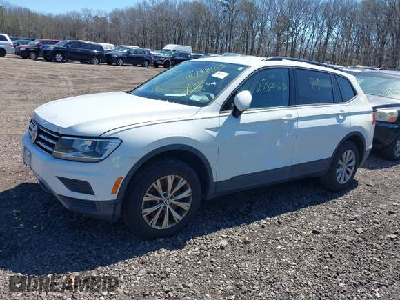 2018 Volkswagen Tiguan S z VIN 3VV1B7AX5JM043090, wystawiony jako IAAI lot #41998165 z przebiegiem Nie podano mil oraz . Historia ofert i sprzedaży dostępna na DreamBid. Obrazek 17.