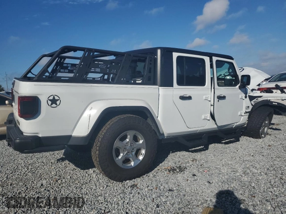 2021 Jeep Gladiator Freedom z VIN 1C6HJTAGXML557586, wystawiony jako Copart lot #43510795 z przebiegiem Nie podano mil oraz Szkoda całkowita • Salvage title. Historia ofert i sprzedaży dostępna na DreamBid. Obrazek 3.