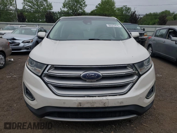 2015 Ford Edge Titanium z VIN 2FMPK4K88FBC05216, wystawiony jako Copart lot #56523475 z przebiegiem 156 558 mil mil oraz Szkoda całkowita • Salvage title. Historia ofert i sprzedaży dostępna na DreamBid. Obrazek 5.