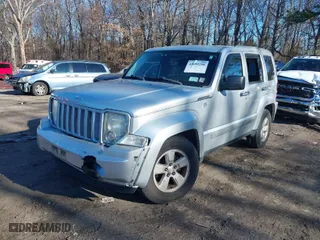 2010 Jeep Liberty Sport with VIN 1J4PN2GK5AW131498, listed as a IAAI auction lot 41099298 with 142,735 mi miles. Bid and sale history available at carsss.com. Image 6.