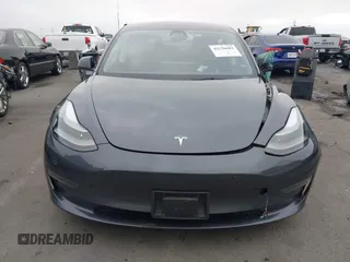 2023 Tesla Model 3 with VIN 5YJ3E1EA4PF705949, listed as a IAAI auction lot 42336682 with 88,056 mi miles and . Bid and sale history available at DreamBid. Image 12.