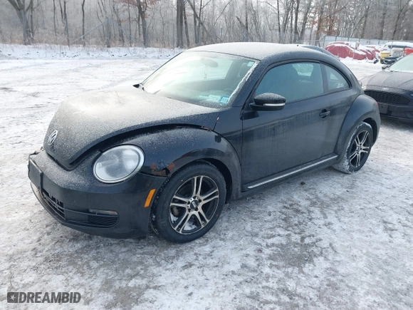 2012 Volkswagen Beetle 2.5L PZEV with VIN 3VWJP7AT8CM619137, listed as a IAAI auction lot 41195954 with 157,741 mi miles. Bid and sale history available at carsss.com. Image 17.