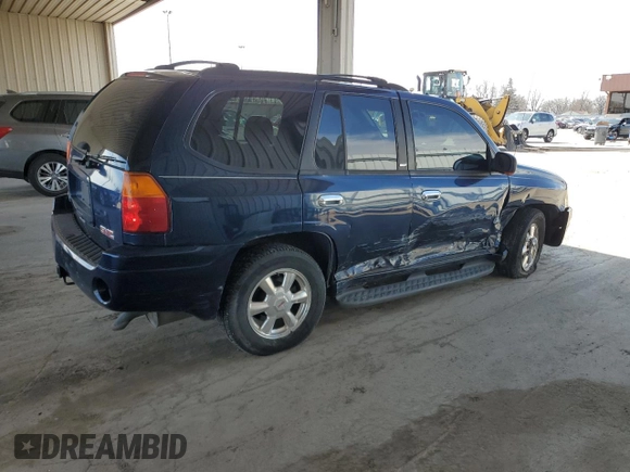 2004 GMC Envoy SLE with VIN 1GKDT13S142201271, listed as a Copart auction lot 50249705 with 248,364 mi miles and Salvage Title. Bid and sale history available at carsss.com. Image 3.