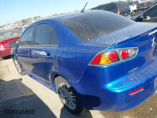 2015 Mitsubishi Lancer ES with VIN JA32U2FU0FU012412, listed as a IAAI auction lot 41766999 with 158,851 mi miles. Bid and sale history available at carsss.com. Image 3.